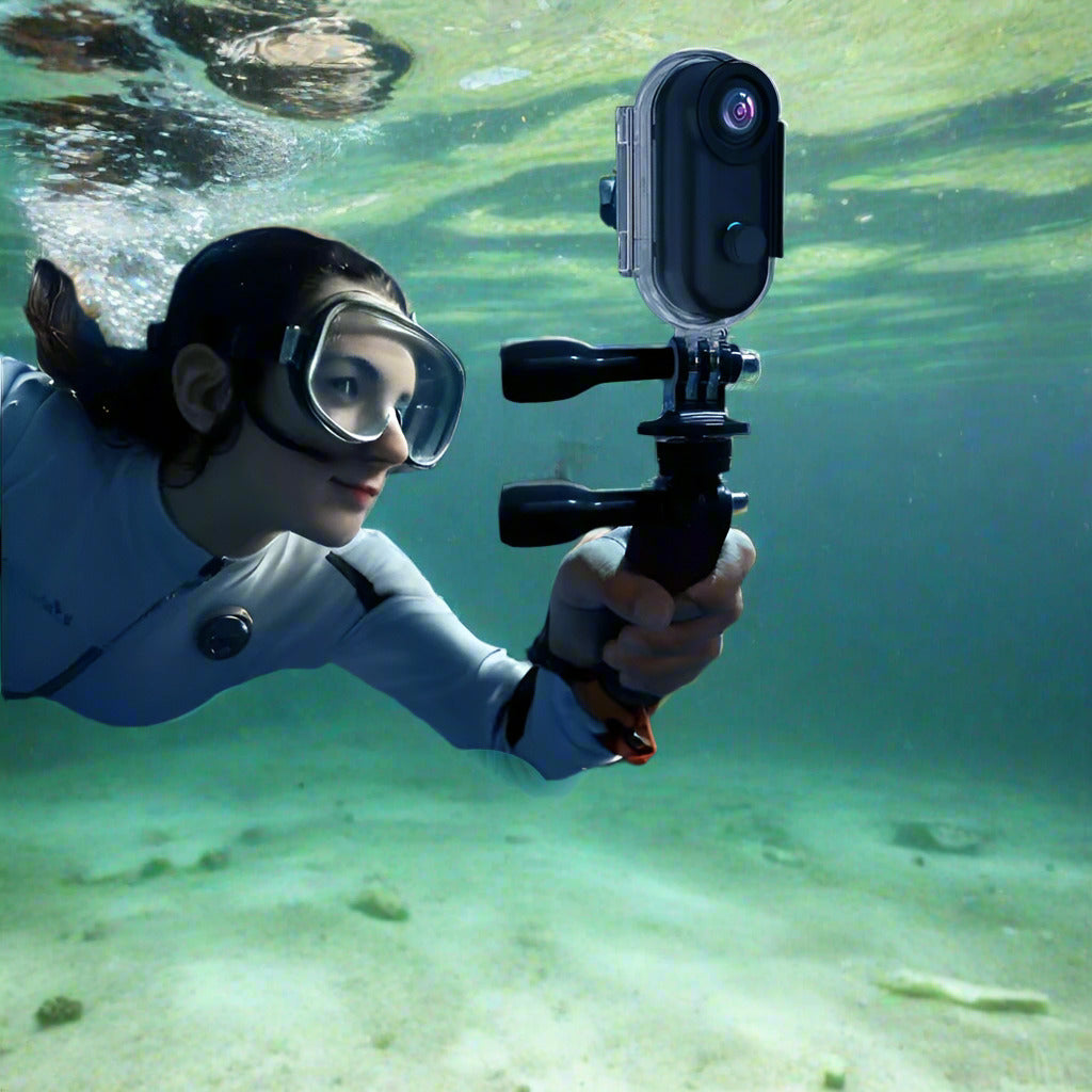 Person underwater holding an underwater camera with a waterproof case, labeled for 30 meters depth.