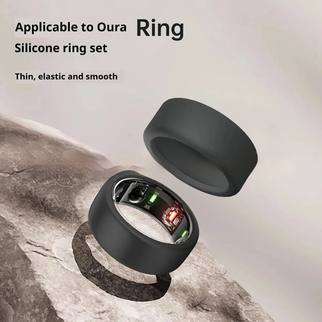 Black silicone ring set with electronic components on a stone surface